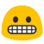 grimacing