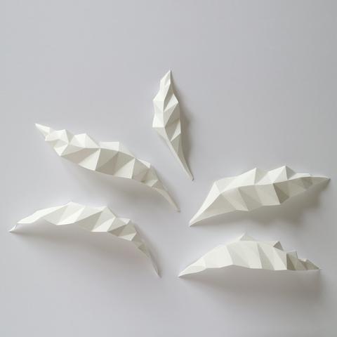 feuilles géométriques de papier pliés