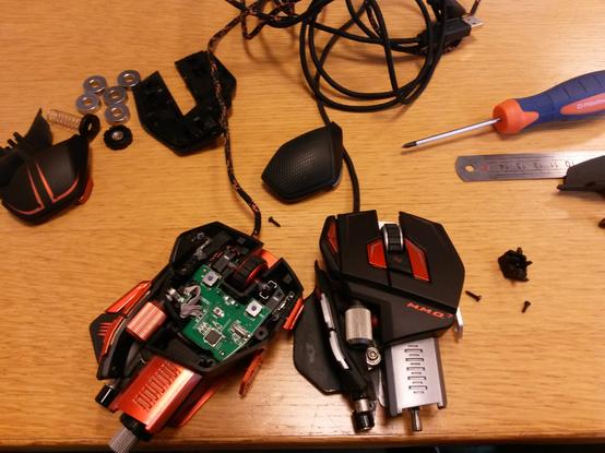 Salvaging two broken mice to build one working one.