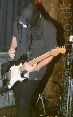 Junk Culture guitarist, wearing a Scream mask