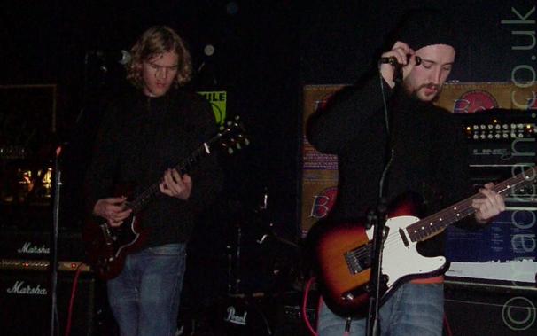 Milk singer/guitarist and bassist/singer