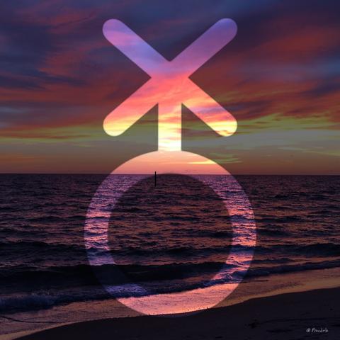 The nonbinary symbol over a picture of an ocean sunset on a beach.