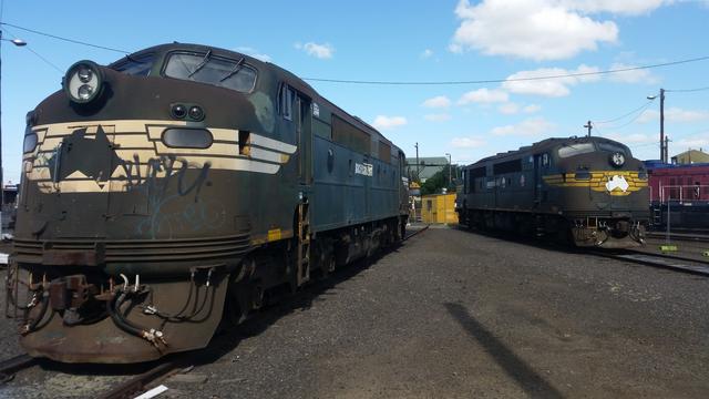 Two Victorian A Class locomotives in Freight Australia livery await scrapping.