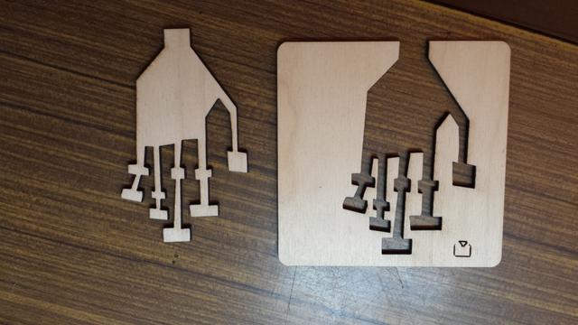 The same blocky hand removed from the piece it was cut from sitting next to it.
