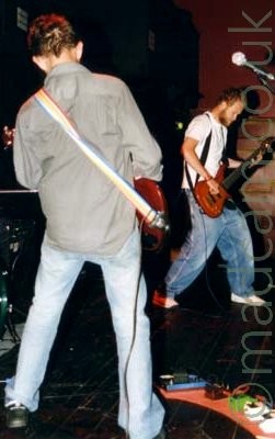 Guitarist/singer and Bassist from Ji rocking out.