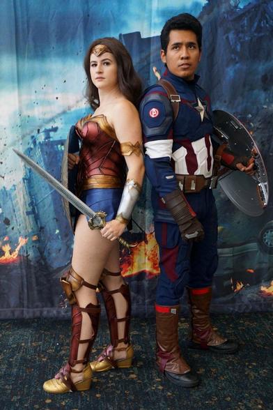 Cosplayers dressed as Wonder Woman and Captain America.