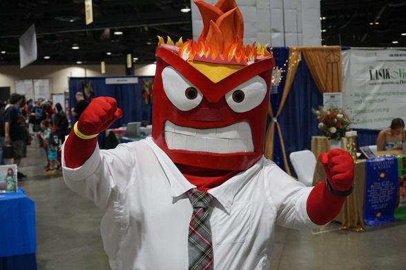 Cosplayer dressed as Anger from Inside-Out.