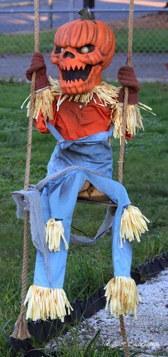 Pumpkin Man on Swing