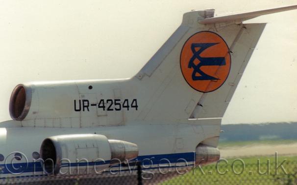 Tail of an Air Ukraine Yak42 at Manchester Airport, mid 1990s.