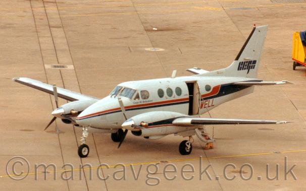 Beech E90 King Air at Manchester Airport, 1996.
