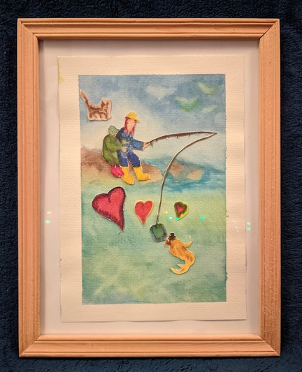 A framed painting made as an 15 years anniversary gift for my wife.

It depicts a woman with yellow boots and yellow cap, holding a fishing rod, sitting on the shore of an island. At the end of the fishing rod is a phone that's being read by a beard-and-hat-wearing fish swimming down below in the sea. 
Sitting next to the woman is a young boy dressed in green with pink boots, with his arms wrapped around the arm of his mother.

Three hearts are in between the woman and the boy, and the fish. The purple outlined heart represents the love from and for our son, the yellow one is my wife's, and the green one is mine.

From the clouds a brown with grey cat, Shiva the Cat, watches over us.