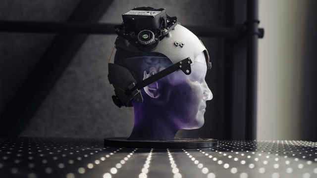 A helmet-like device with sensors strapped to a mannequin’s head.