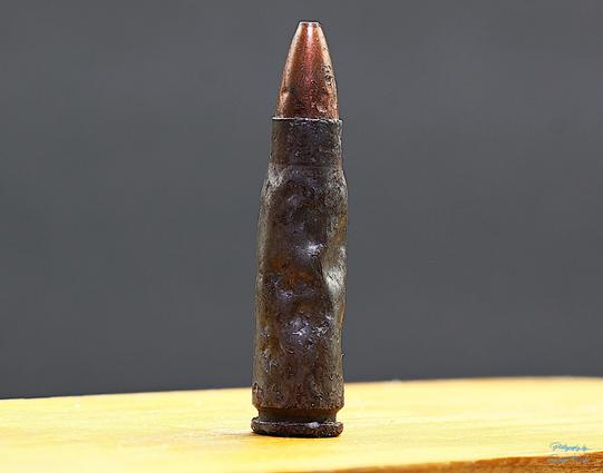 A rimless bottlenecked intermediate cartridge 7.62X39mm hollow point.
