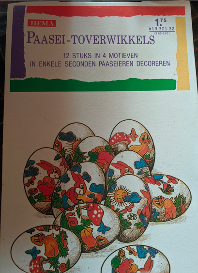 Front of package of Hema Paasei-Toverwikkels (Hema's easter egg magic wraps)
A drawing of a collection of decorated eggs, and at the top a banner with its name, Dutch text explaining it contains 12 wraps in 4 designs, used to decorate easter eggs in mere seconds. Its price is 1.75, which likely was pre-Euro Dutch Guilders.