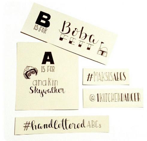Lettering of the phrases “A is for Anakin Skywalker” and “B is for Boba Fett” accompanied by sketches of the Star Wars characters’ headgears