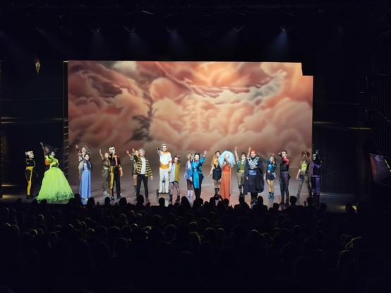 The core cast of the musical in singing the Finale.