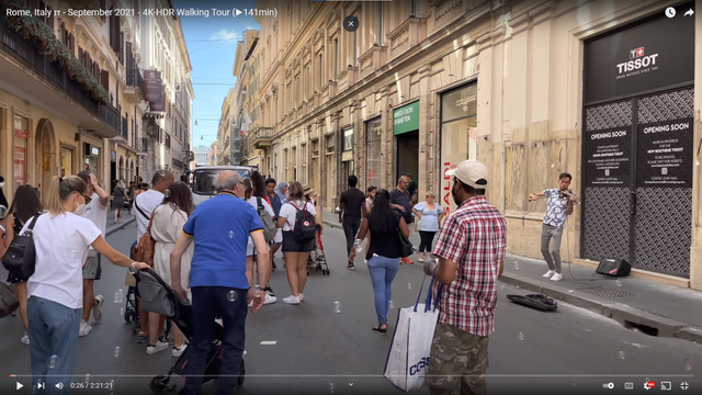 screenshot of a youtube video of a busy street in rome
