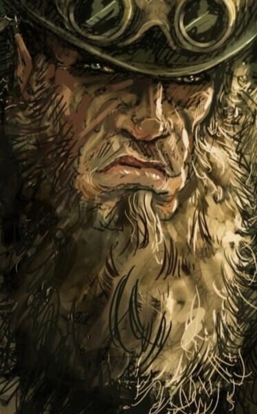 Detail crop of just the bearded face, staring out from beneath the brim of their hat.