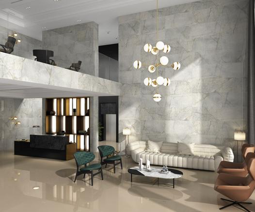 Natural coloured Chart floor and wall tiles in a double height living room