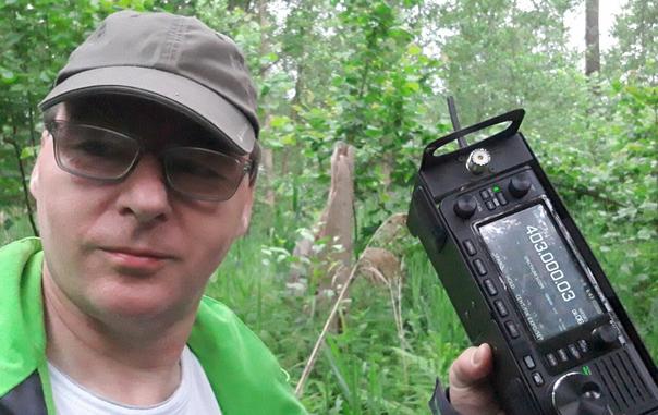 Hunting in the forest for radiosonde from a weather balloon.