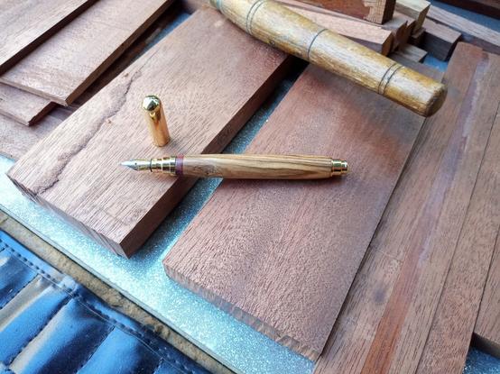 A Fountain pen from olive wood and Madagascar palisander (bois de rouge).