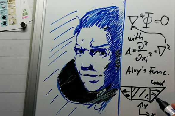 portrait on a whiteboard with some mathematical formulas