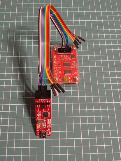 Buspirate and USBasp  programmer connected with a rainbow ribbon cable