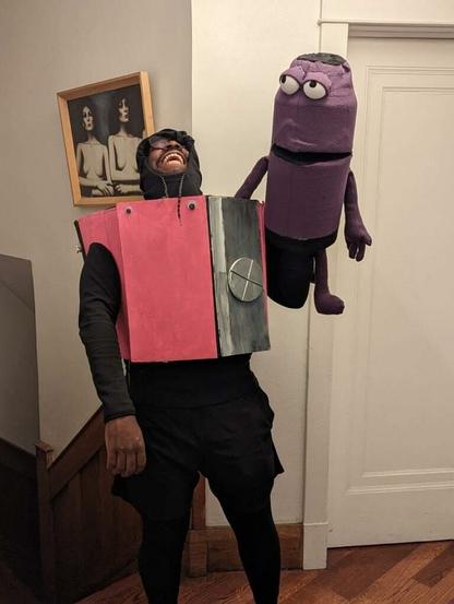First version of Sterling, mostly a purple tube with hands and feet. I'm wearing my pink sharpener costume