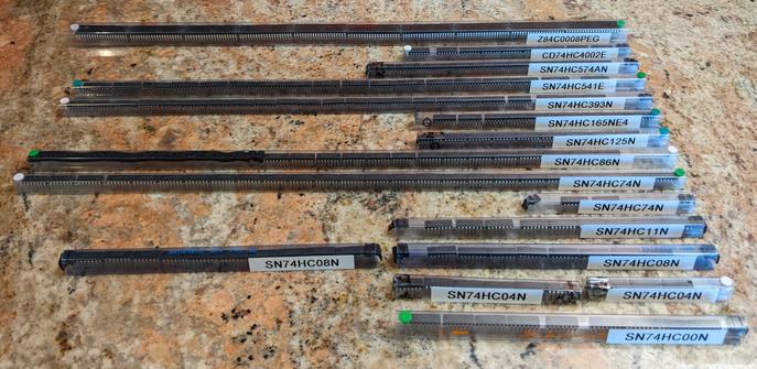 Tubes of 7400 series DIP ICs on the kitchen counter.
