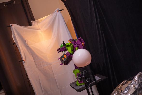 Setup for a 2 sided light shot. Diffusion material in front of one strobe and globe light with CTO gel inside covering the other strobe