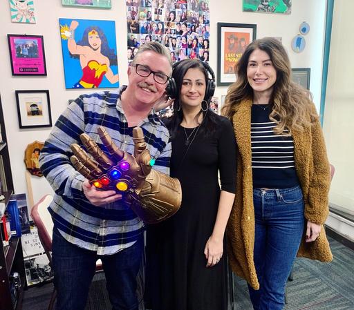 This photo features actor Paul McGillion wearing a Thanos gauntlet, podcaster Sabrina Rani Furminger, and actress Jewel Staite. The trio are standing in the middle of the YVR Screen Scene Podcast lab, having just recorded an episode of Sabrina’s podcast.