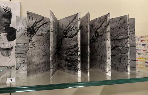 Christine Khonjie (born Iran, 1947)
The poet's coat, after Hafez, 2021

A book, in onl, graphite and collage.