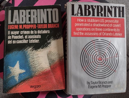 Two books. The Spanish and English versions of 'Labyrinth', by Eugene M Popper and Taylor Branch. About the assassination of Orlando Letelier.