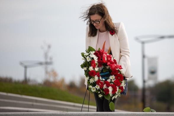UTM VPP Alexandra Gillespie lays a wreath during a Remembrance Day ceremony on campus