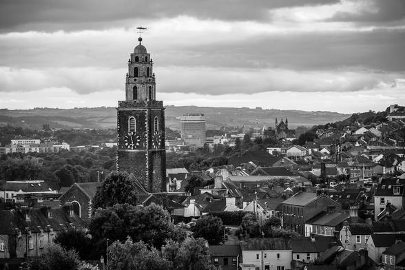 The north side of Cork City, with Shandon Bells in the foreground, the County Hall in the background and many homes.