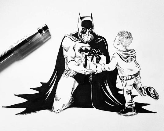 Batman handing a boy a gift