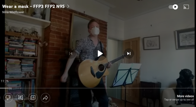 I'm playing a selection of cover songs while wearing a decent mask.