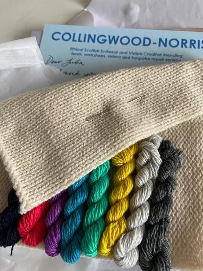 Knitted fabric with seven different colour mini skeins of yarn
