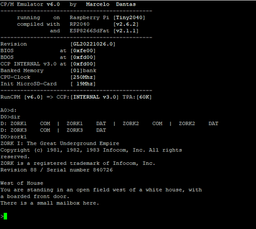 RunCPM booting CP/M showing the first screen of Zork1.
The game reads
"West of House
You are standing in an open field west of a white house, with a boarded front door.
There is a small mailbox here."