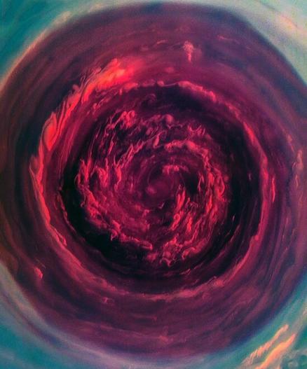 Saturn's northern vortex in near-infrared false color.