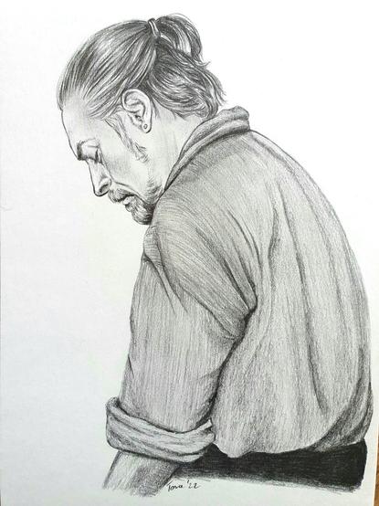 A drawing of a pirate captain sitting down in a resigned way, looking down.