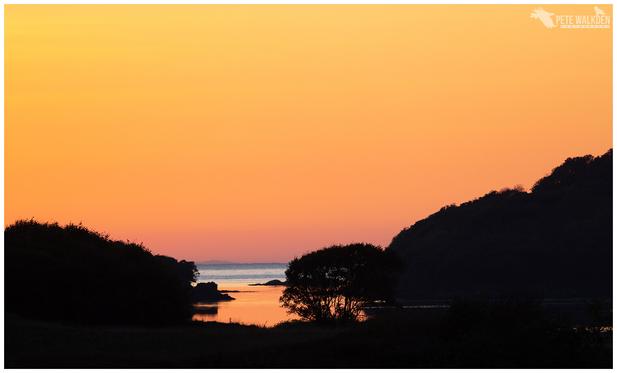 Sunset over the inlet of Loch Cuin on the Isle Of Mull.