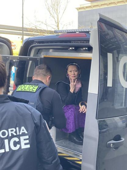 Arrested & in the paddy wagon.