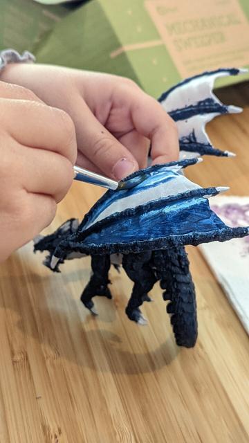 Blue dragon mini being painted