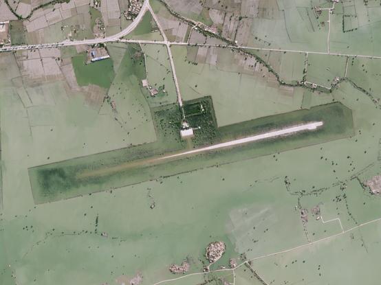 Airport and surroundings still partially flooded.