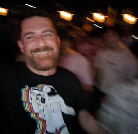 Daryl actually smiling!!! (Blurred photo from a festival)