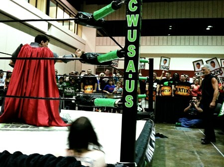 Picture of a wrestling ring at megacon unrelated to the tweet.  taken from https://archive.artix.com/designNotes/post/14919/Review-of-MegaCon-2013