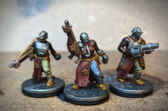 Three chaos cultists from the Blackstone Fortress set. These have dark skin tones.