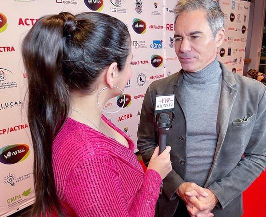 Sabrina Rani Furminger interviewing Eric McCormack on the UBCP / ACTRA Red Carpet.