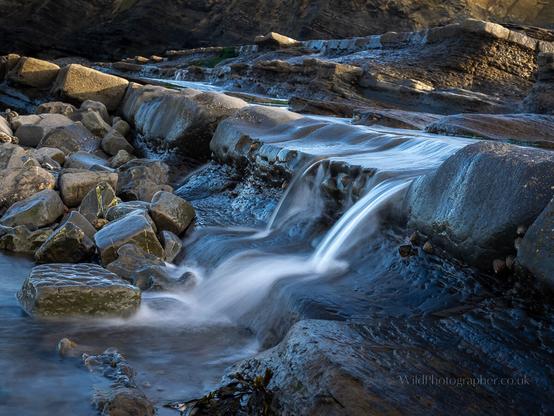 Small waterfall in slow motion on the Somerset coast